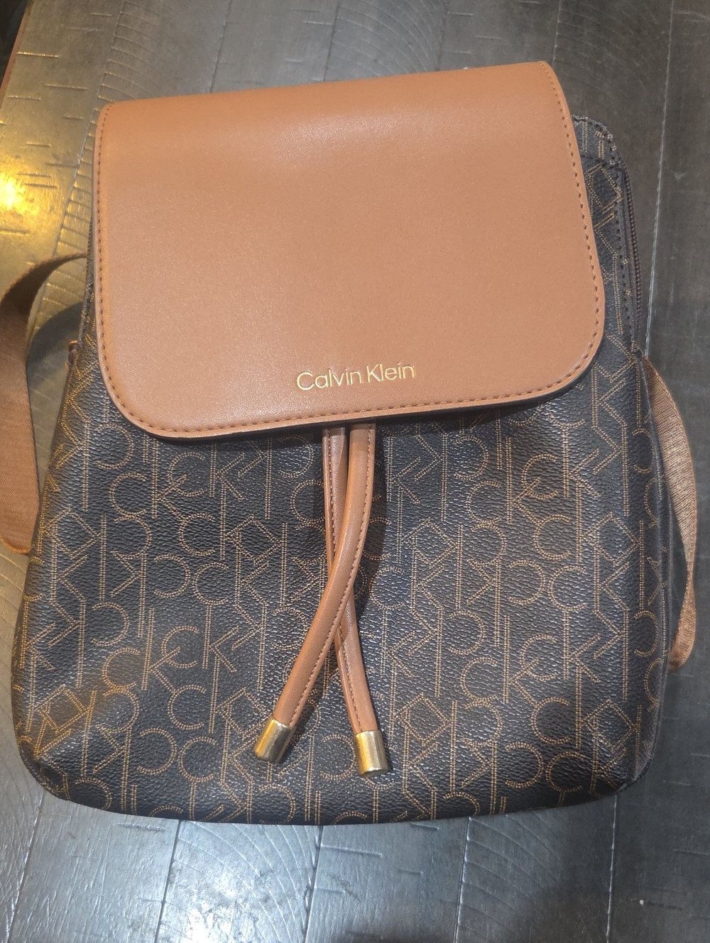 Calvin Klein Monogram Brown and Tan Drawstring Backpack